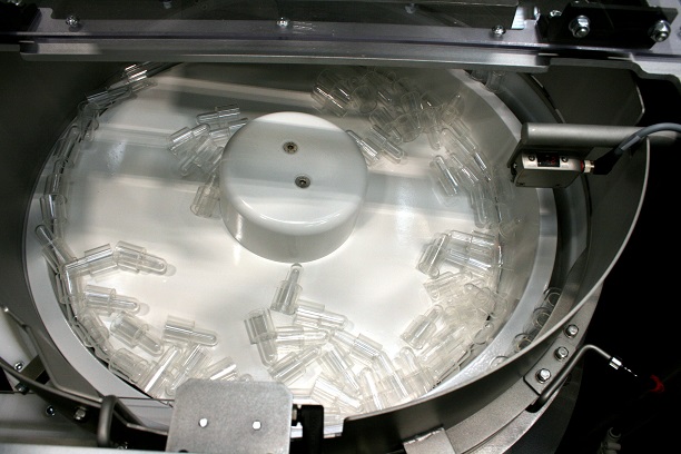 Centrifugal Feeder feeds and orientates Test Unit Body