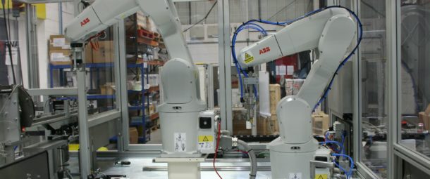 Six axis robot clipping and welding system.
