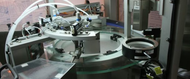 An automated quality control & vision inspection system to handle & inspect blister packed tablets.