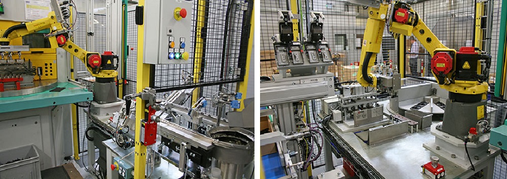 Six-axis robots load and unload a vertical injection moulding machine and an insert to the moulding