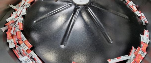 High speed feeding system for wrapped fruit bars