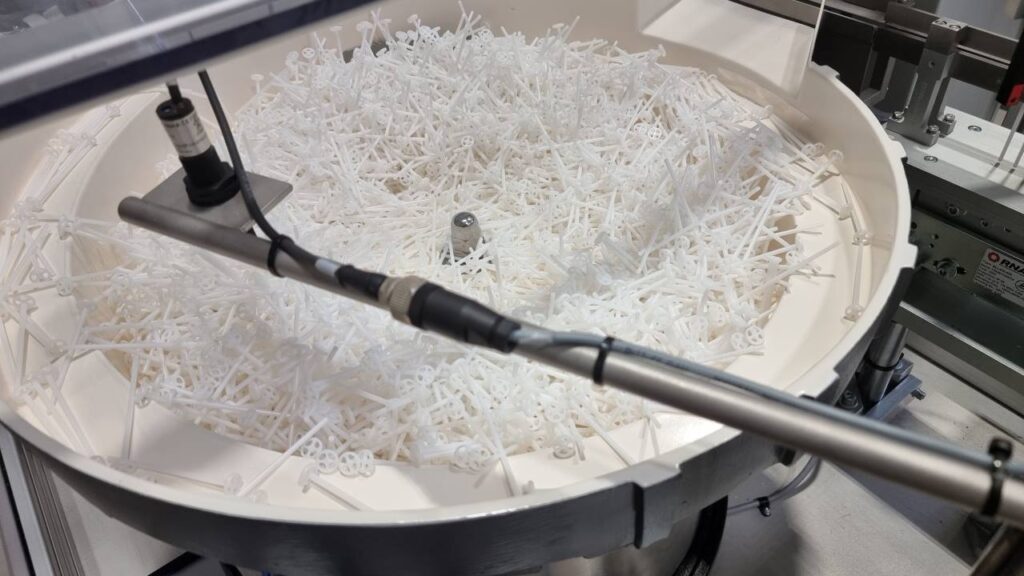 Bowl Feeder to feed, count, and dose Transfer Loops