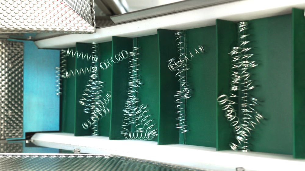 Spring Feed System with detangler - Elevator conveyor