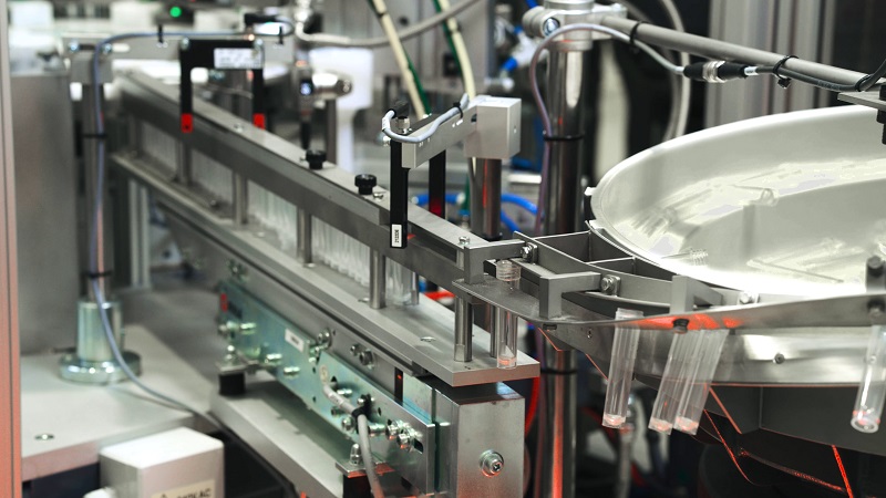 Vibratory Bowl Feeder feeds Vials vibratory bowl