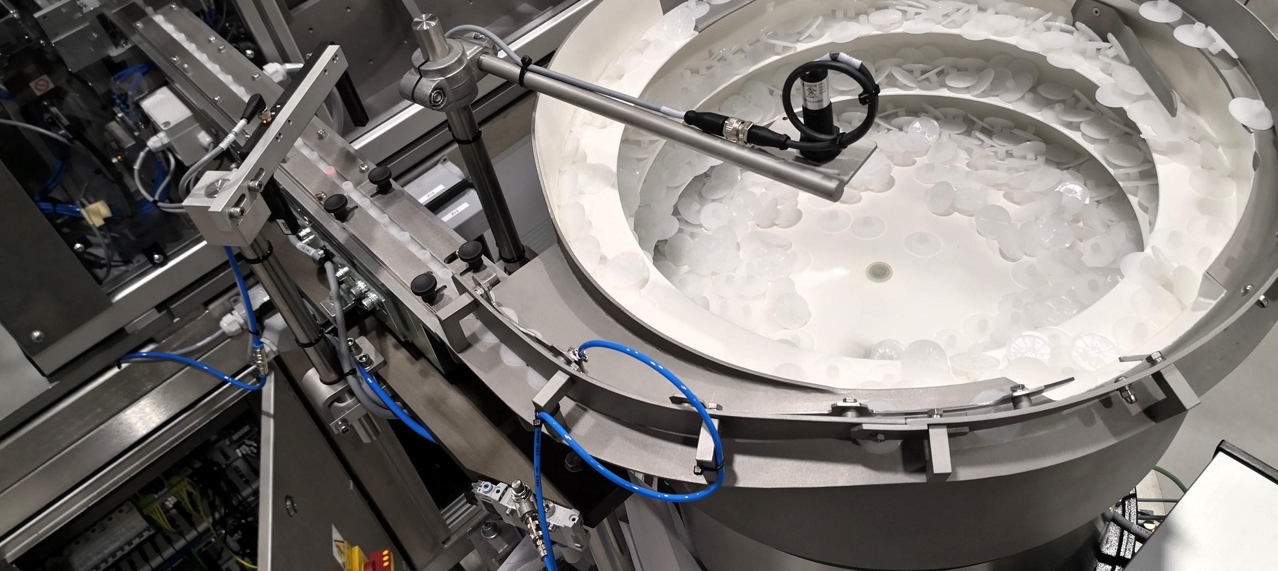 Bowl Feeders to feed and orientate Outlets and Inlets