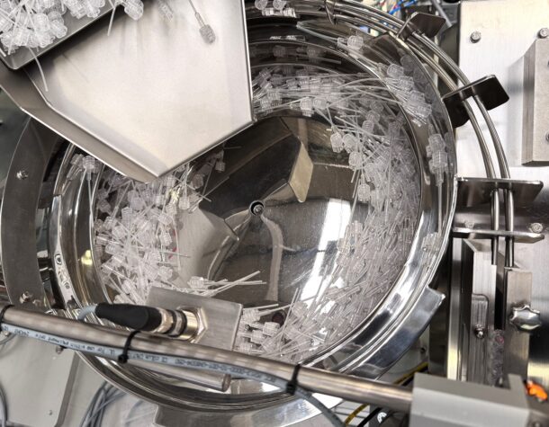 Bowl Feeders to feed and orientate Luer Lock with Tube