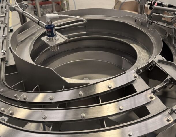 High-Speed Bowl Feed Systems for Hygiene Monitoring System Assembly