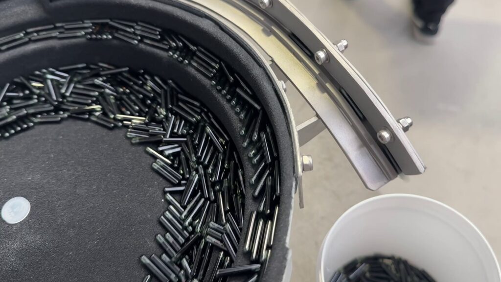 Bowl Feeder to feed and orientate glass components - Outfeed