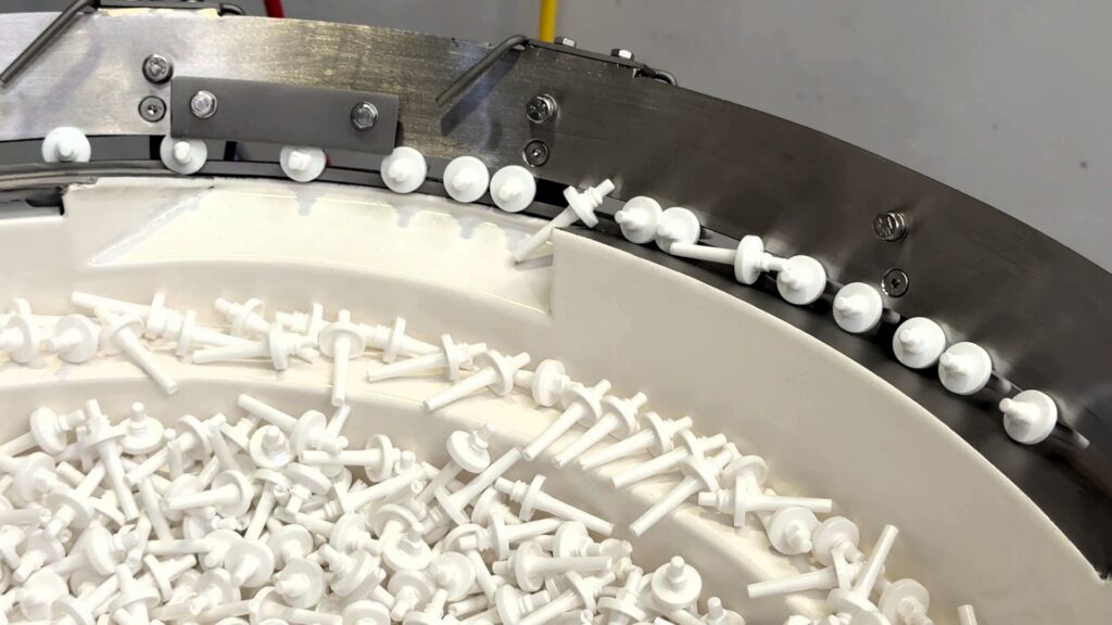 Bowl Feeder to feed and orientate handles - bowl top