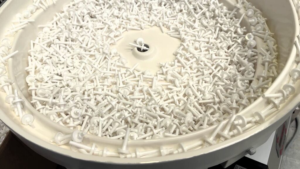 Bowl Feeder to feed and orientate handles - bowl track